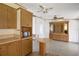 Kitchen with wood cabinets, microwave, and built-in hutch at 450 Tivoli Park Dr, Davenport, FL 33897