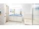 Bathroom with double vanity, bathtub, and shower at 223 Lake Davenport Estates, Davenport, FL 33897
