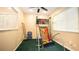 Game room with arcade basketball game and seating at 223 Lake Davenport Estates, Davenport, FL 33897