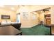 Game room features a TV, gaming area and a view of a basketball hoop at 223 Lake Davenport Estates, Davenport, FL 33897