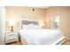 Bedroom with queen-size bed and en-suite bathroom access at 223 Lake Davenport Estates, Davenport, FL 33897