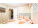 Bedroom with a double bed and access to another room at 223 Lake Davenport Estates, Davenport, FL 33897