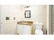 Bathroom with granite countertop and toilet at 223 Lake Davenport Estates, Davenport, FL 33897