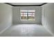 Bright and airy living room with large window at 2727 W Oak Ridge Rd # 3, Orlando, FL 32809