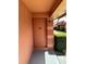 Condo front door entrance with a pathway at 2727 W Oak Ridge Rd # 3, Orlando, FL 32809