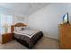 Bedroom with a queen bed and en-suite bathroom at 523 Balmoral Dr, Davenport, FL 33896