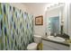Clean bathroom with shower, toilet and vanity at 523 Balmoral Dr, Davenport, FL 33896