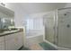 Bathroom boasts a soaking tub and walk-in shower at 523 Balmoral Dr, Davenport, FL 33896