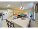 Kitchen with adjoining dining area, ready for Gathering meals at 523 Balmoral Dr, Davenport, FL 33896