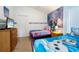 Frozen themed bedroom with two twin beds at 523 Balmoral Dr, Davenport, FL 33896
