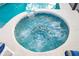 Relax in this bubbling hot tub, conveniently located next to the pool at 523 Balmoral Dr, Davenport, FL 33896