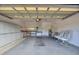 Attached garage with storage and room for two cars at 520 Vista Oaks Way, Davenport, FL 33837