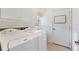 Laundry room with washer, dryer, and cabinets at 520 Vista Oaks Way, Davenport, FL 33837