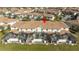 Aerial view highlighting townhome and pool area at 4845 Romeo Cir, Kissimmee, FL 34746