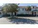 Front view of a townhome with parking at 4845 Romeo Cir, Kissimmee, FL 34746