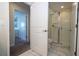 Modern bathroom with a walk-in shower and tiled floors at 4845 Romeo Cir, Kissimmee, FL 34746