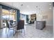 Open concept kitchen and dining area with modern appliances and stylish decor at 4845 Romeo Cir, Kissimmee, FL 34746
