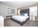 Main bedroom with king-size bed and ample natural light at 4845 Romeo Cir, Kissimmee, FL 34746