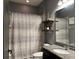 Clean bathroom with granite countertop and shower at 12254 Sandy Apple Rd, Orlando, FL 32824