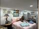 Well-lit bedroom with a comfortable bed and nightstand at 12254 Sandy Apple Rd, Orlando, FL 32824