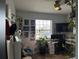 Charming home office with a desk and wall art at 12254 Sandy Apple Rd, Orlando, FL 32824