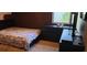 Cozy bedroom featuring a double bed and dresser at 12254 Sandy Apple Rd, Orlando, FL 32824