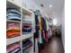 Large walk-in closet with shelving and hanging space for clothes and accessories at 1542 Sun Meadow Dr, Orlando, FL 32824