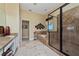 Main bathroom with double vanity, granite countertop, soaking tub, and walk-in shower at 1542 Sun Meadow Dr, Orlando, FL 32824