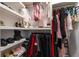 Large walk-in closet with ample shelving and hanging space for clothes and shoes at 1542 Sun Meadow Dr, Orlando, FL 32824
