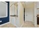 Built-in wet bar with a wine rack, granite countertop, and white cabinets at 1542 Sun Meadow Dr, Orlando, FL 32824