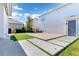 Artificial turf backyard with patio and walkway at 13010 Stoddart Ave, Orlando, FL 32827