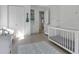 ' bedroom with crib and built-in shelving at 13010 Stoddart Ave, Orlando, FL 32827