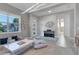 Playroom with entryway and view into bathroom, showcasing an open floorplan at 13010 Stoddart Ave, Orlando, FL 32827