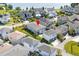 Aerial view of a house near a lake in a residential area at 13010 Stoddart Ave, Orlando, FL 32827