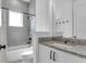 Clean bathroom, shower/tub combo, granite countertop at 13010 Stoddart Ave, Orlando, FL 32827