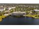 Aerial view of a waterfront restaurant and surrounding community at 13010 Stoddart Ave, Orlando, FL 32827