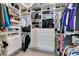 Spacious walk-in closet with ample shelving and hanging space at 13010 Stoddart Ave, Orlando, FL 32827