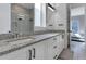 Double vanity bathroom with granite countertops and modern fixtures at 13010 Stoddart Ave, Orlando, FL 32827
