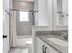 Bathroom with tub, shower, and granite vanity at 13010 Stoddart Ave, Orlando, FL 32827