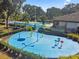 Community water park with spray pad and playground at 3381 Marshfield Preserve Way, Kissimmee, FL 34746