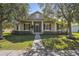 Two-story house with front porch and landscaped yard at 3381 Marshfield Preserve Way, Kissimmee, FL 34746