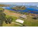 Community features a lakefront with sandy volleyball court at 3381 Marshfield Preserve Way, Kissimmee, FL 34746