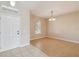 Bright dining room with tile floors and natural light at 3381 Marshfield Preserve Way, Kissimmee, FL 34746