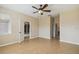 Spacious bedroom with tile floors and ceiling fan at 3381 Marshfield Preserve Way, Kissimmee, FL 34746