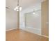 Spacious dining room with tile floors and a chandelier at 3381 Marshfield Preserve Way, Kissimmee, FL 34746