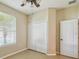 Bright bedroom with double door closet and window at 3381 Marshfield Preserve Way, Kissimmee, FL 34746