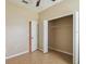 Bedroom with closet and access to bathroom at 3381 Marshfield Preserve Way, Kissimmee, FL 34746