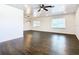 Living room with hardwood floors, recessed lighting, and a ceiling fan at 117 W Maple St, Davenport, FL 33837