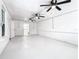 Spacious bonus room with two ceiling fans and exterior access at 117 W Maple St, Davenport, FL 33837