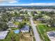 Aerial view showing a single story house and neighborhood at 117 W Maple St, Davenport, FL 33837